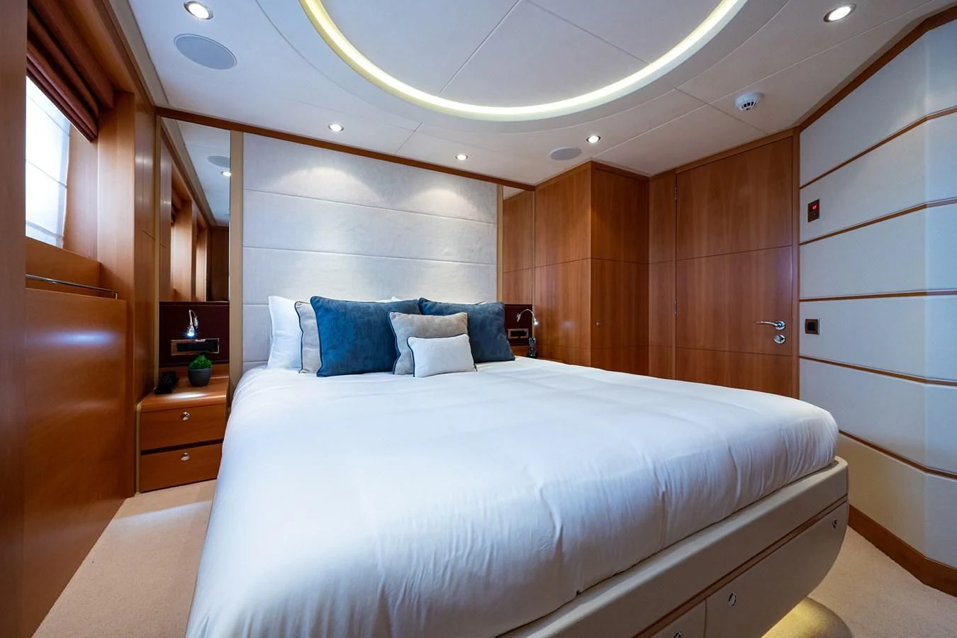 a bed in a room aboard SHARKFINN Yacht for Sale