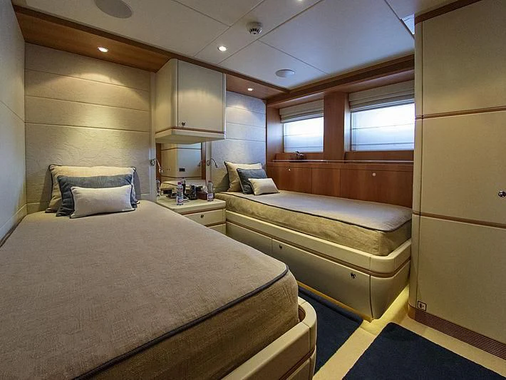 a room with two beds aboard SHARKFINN Yacht for Sale