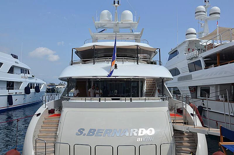 a boat with a couple of people on it aboard SHARKFINN Yacht for Sale