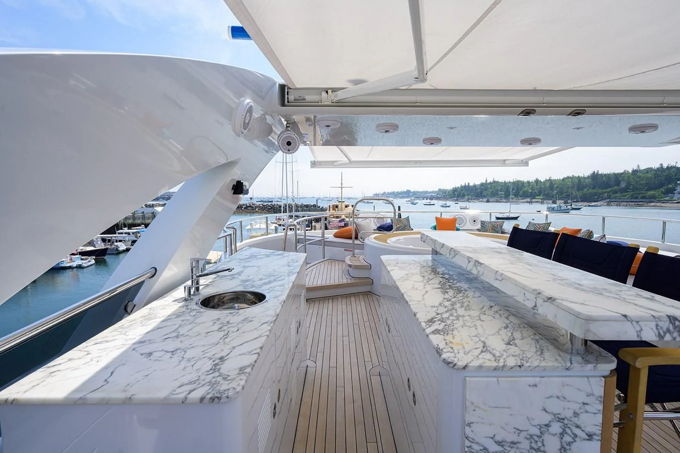 a deck with a boat on it aboard SHARKFINN Yacht for Sale
