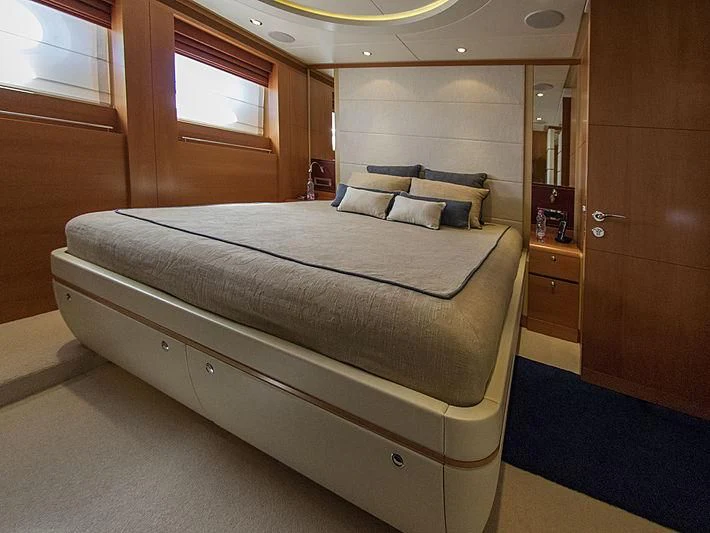 a bed in a room aboard SHARKFINN Yacht for Sale