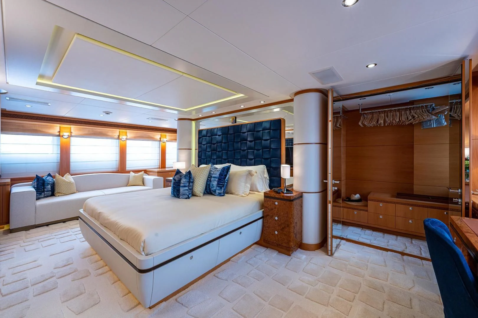 a room with a couple of beds aboard SHARKFINN Yacht for Sale