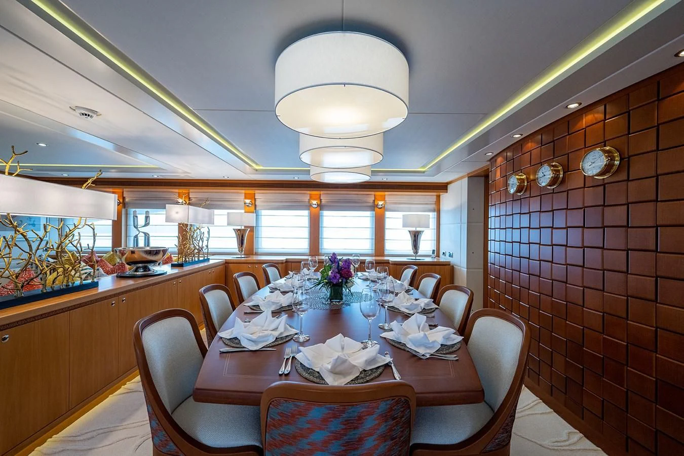 a dining room with a table aboard SHARKFINN Yacht for Sale