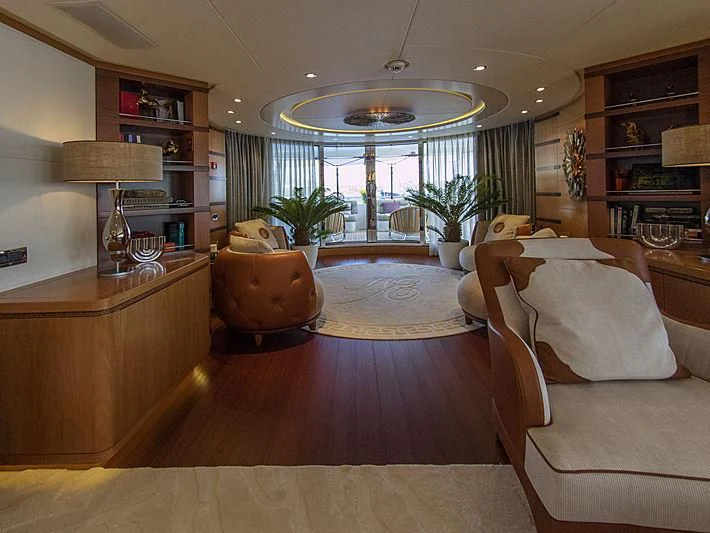 a living room with a large window aboard SHARKFINN Yacht for Sale