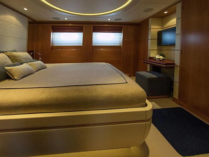 a bed in a room aboard SHARKFINN Yacht for Sale