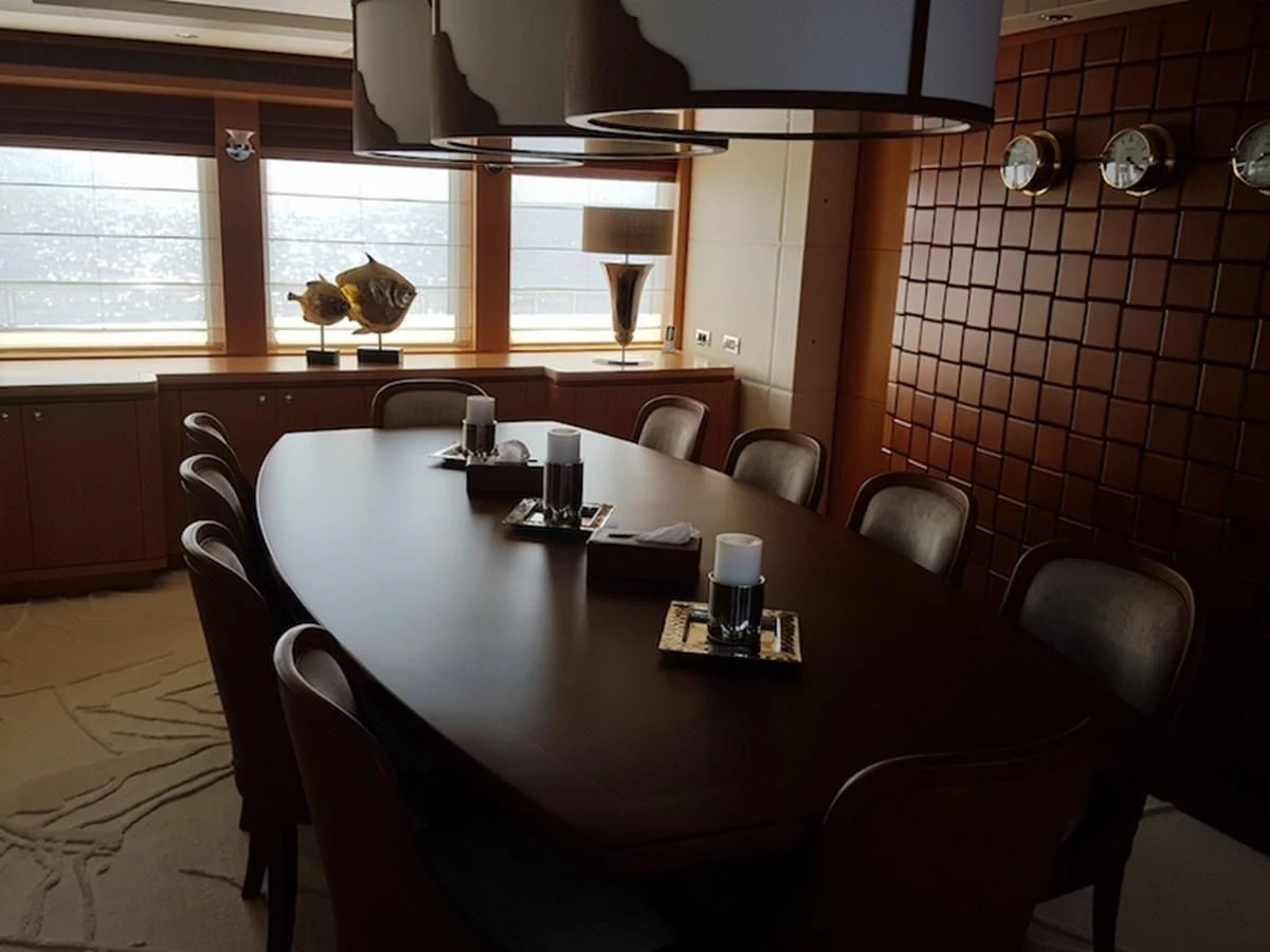 a dining table in a restaurant aboard SHARKFINN Yacht for Sale
