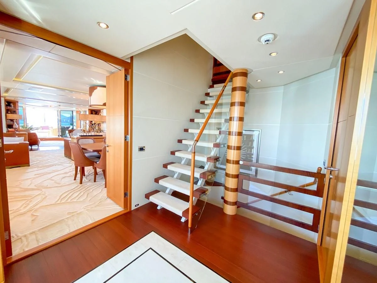 a staircase in a house aboard SHARKFINN Yacht for Sale