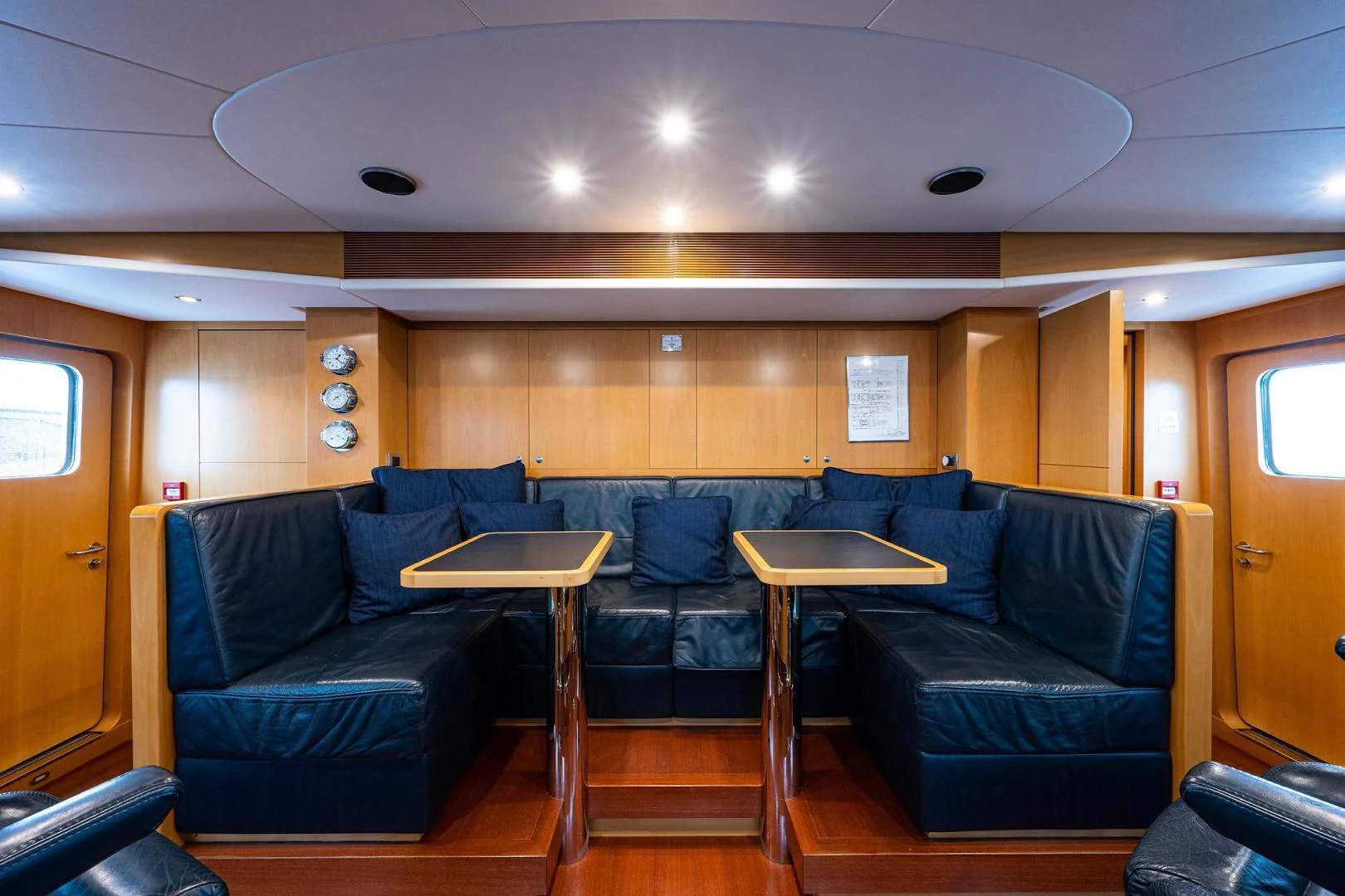 a living room with a couch and a table aboard SHARKFINN Yacht for Sale
