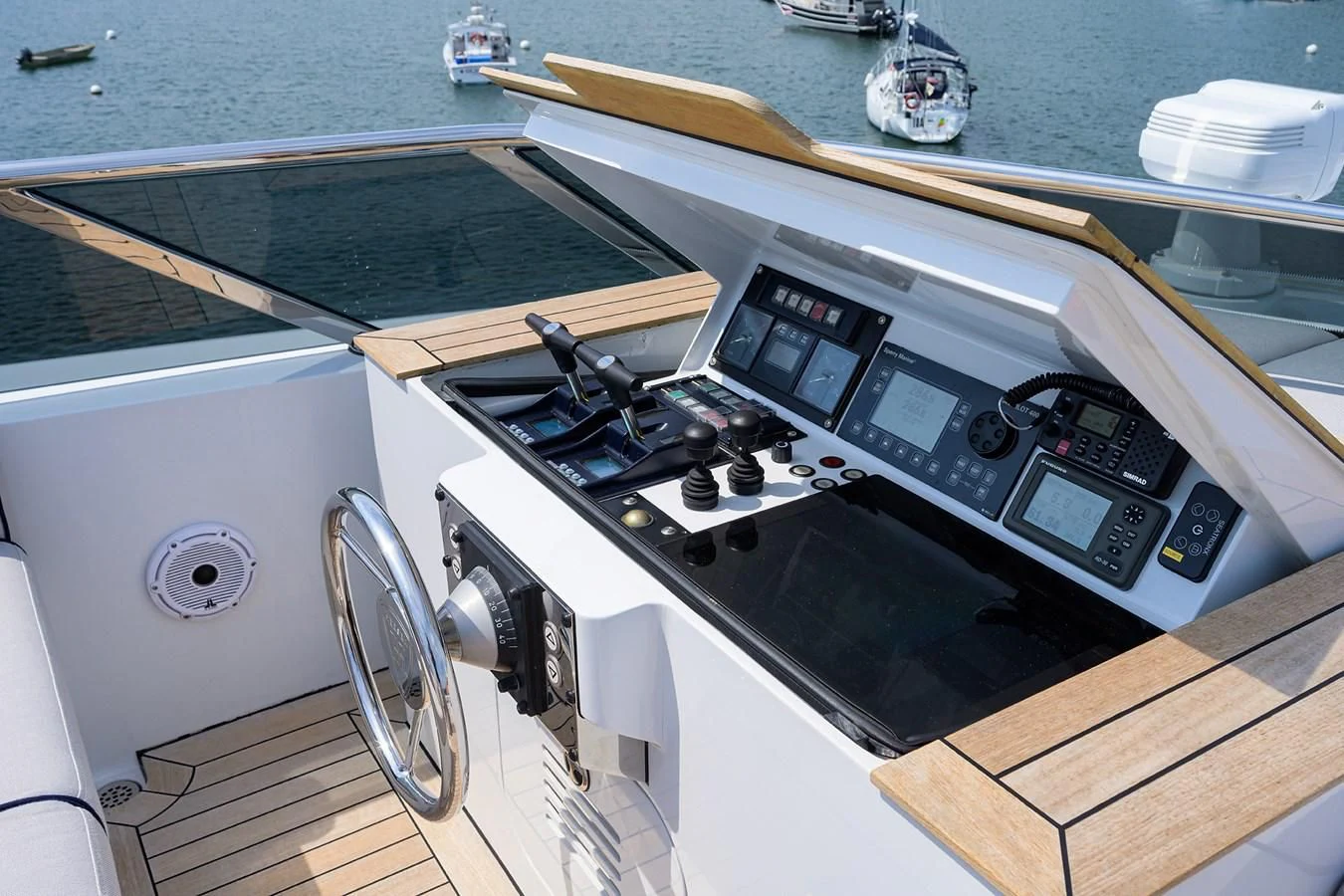 a stove top with a wood board aboard SHARKFINN Yacht for Sale