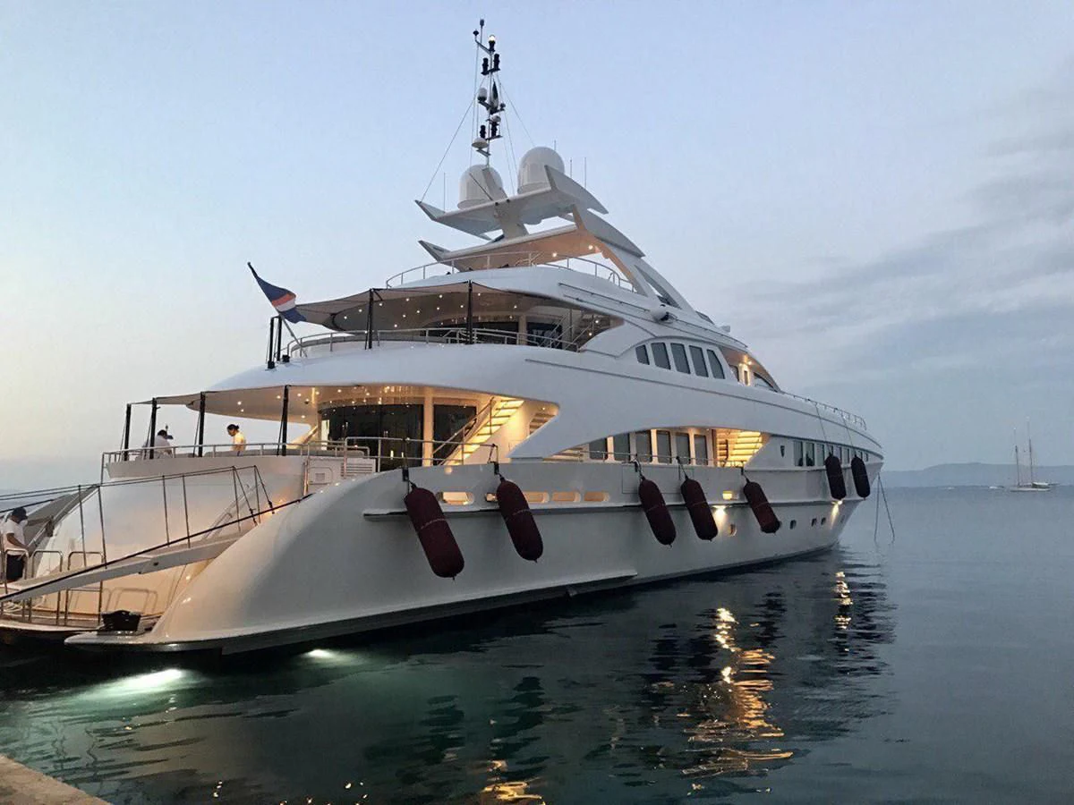 a large white boat in the water aboard SHARKFINN Yacht for Sale