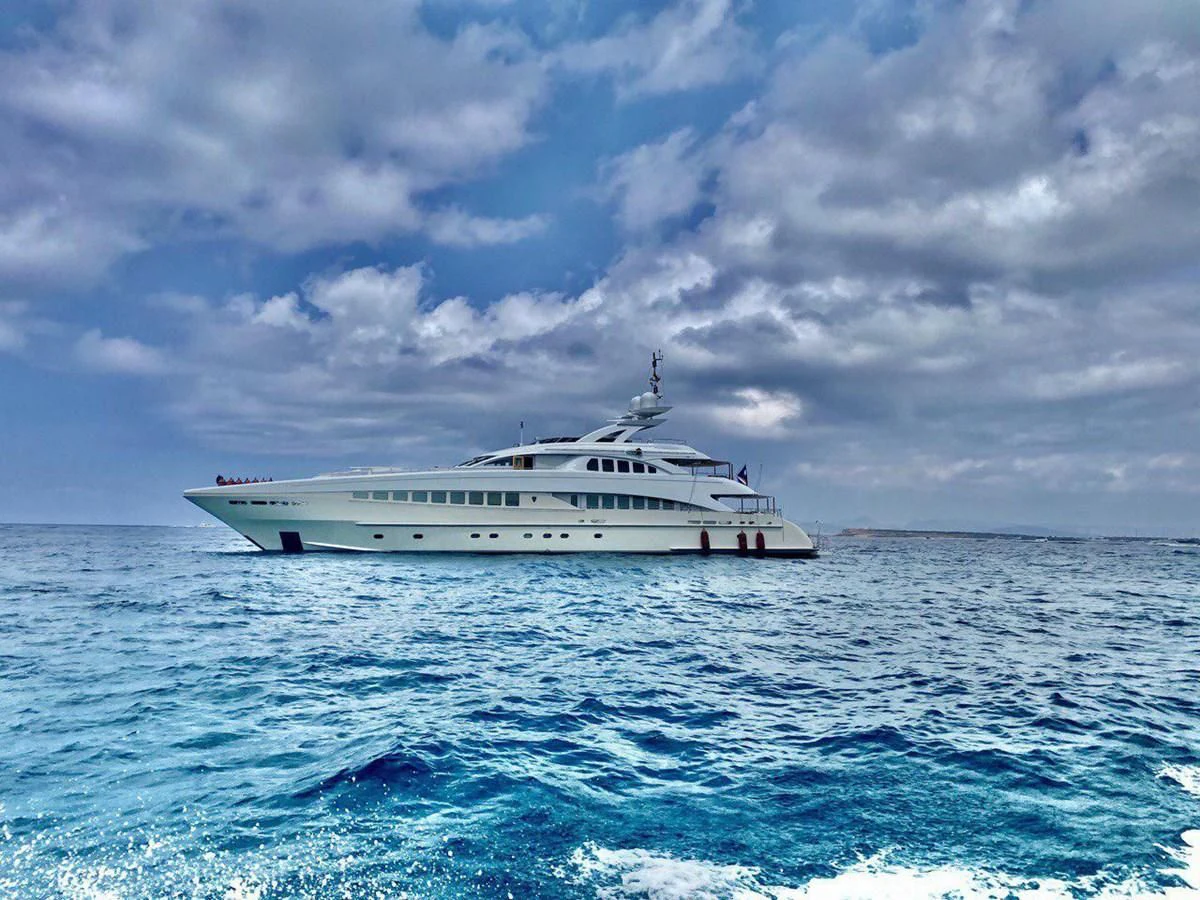 a white boat in the water aboard SHARKFINN Yacht for Sale