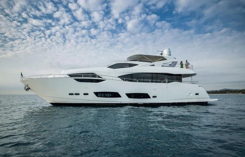 a white yacht on the water aboard LADY M Yacht for Sale