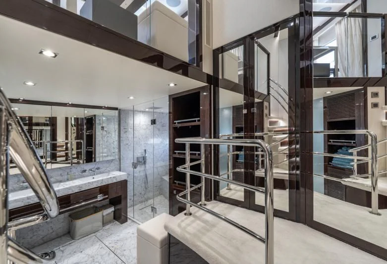 a room with a staircase and a set of stairs aboard LADY M Yacht for Sale