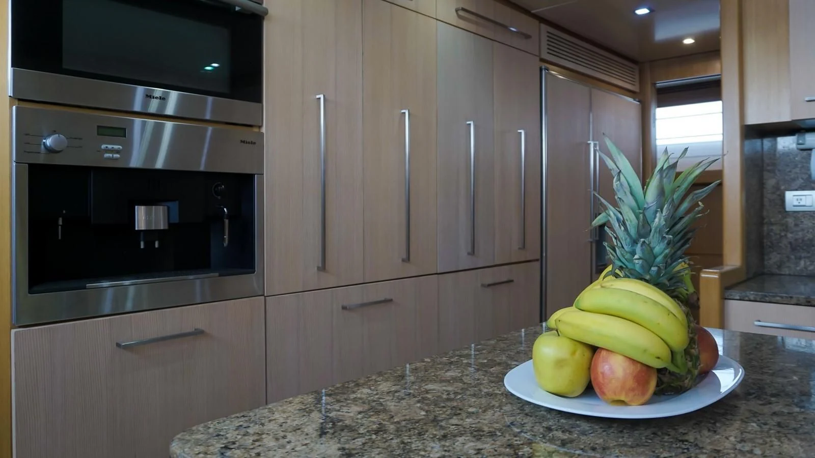 a bowl of fruit on a counter aboard PETRUS Yacht for Sale