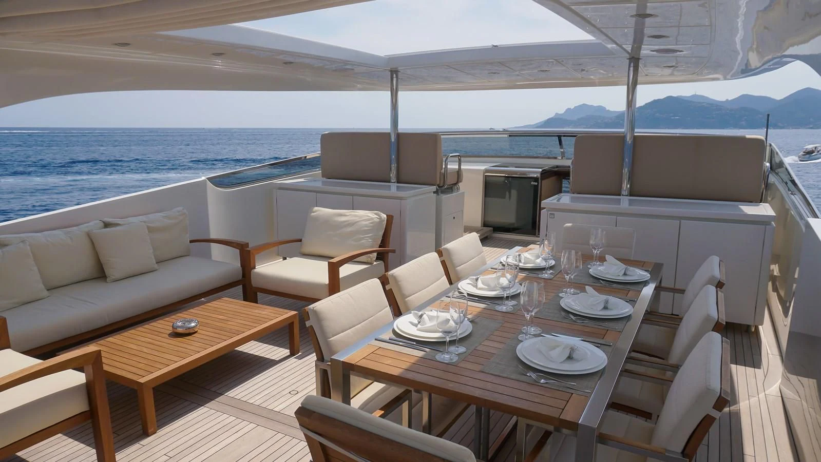 a table set for a meal on a boat aboard PETRUS Yacht for Sale