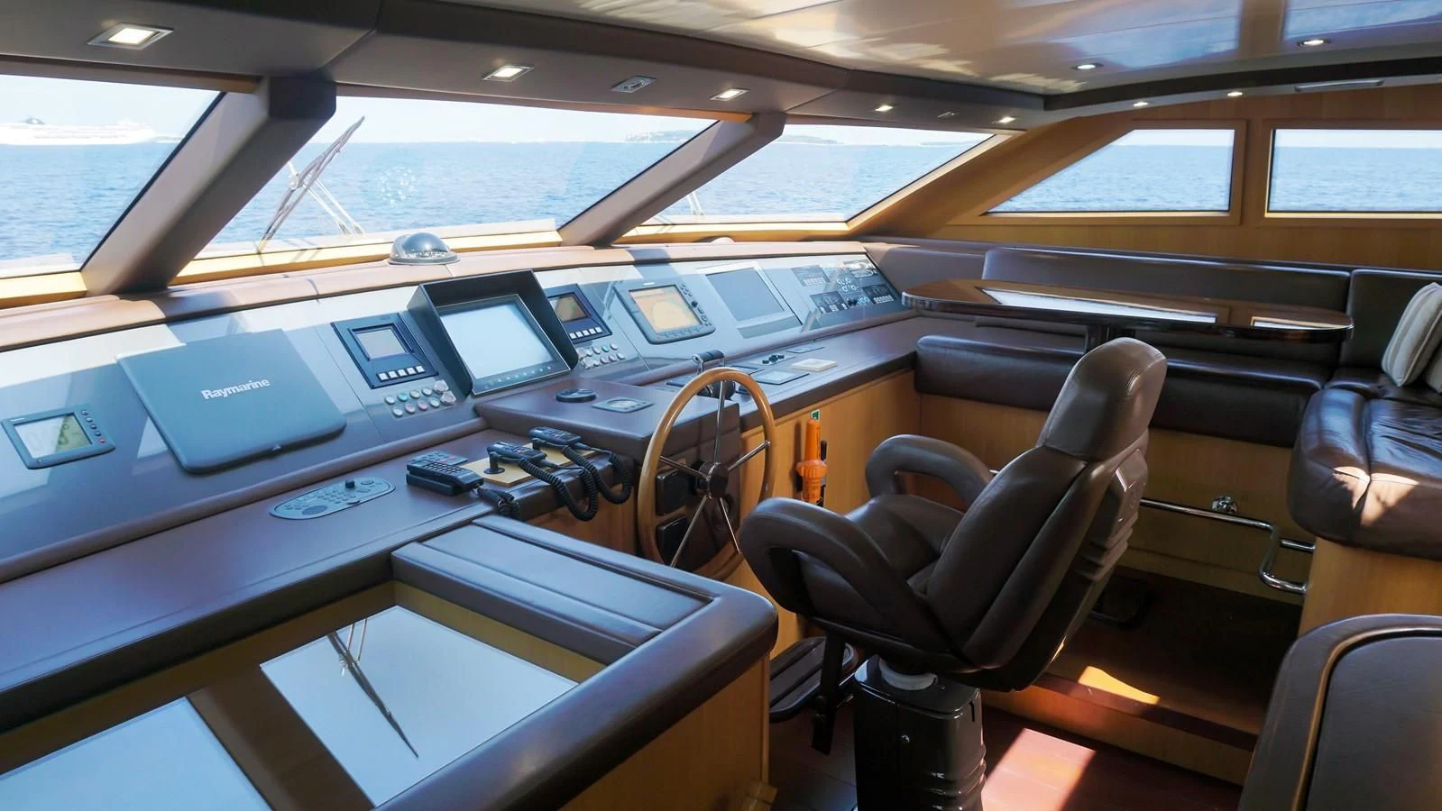 inside of a vehicle with seats and screens aboard PETRUS Yacht for Sale