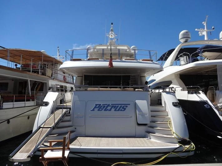 a boat docked at a pier aboard PETRUS Yacht for Sale