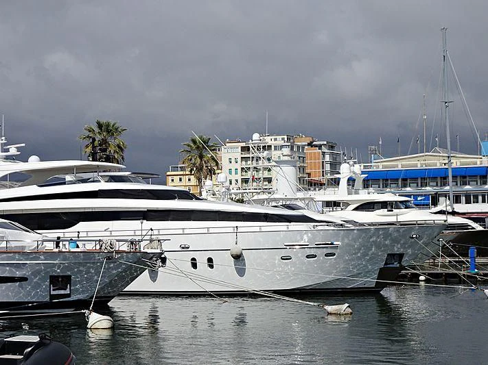 a group of boats are parked in a harbor aboard PETRUS Yacht for Sale