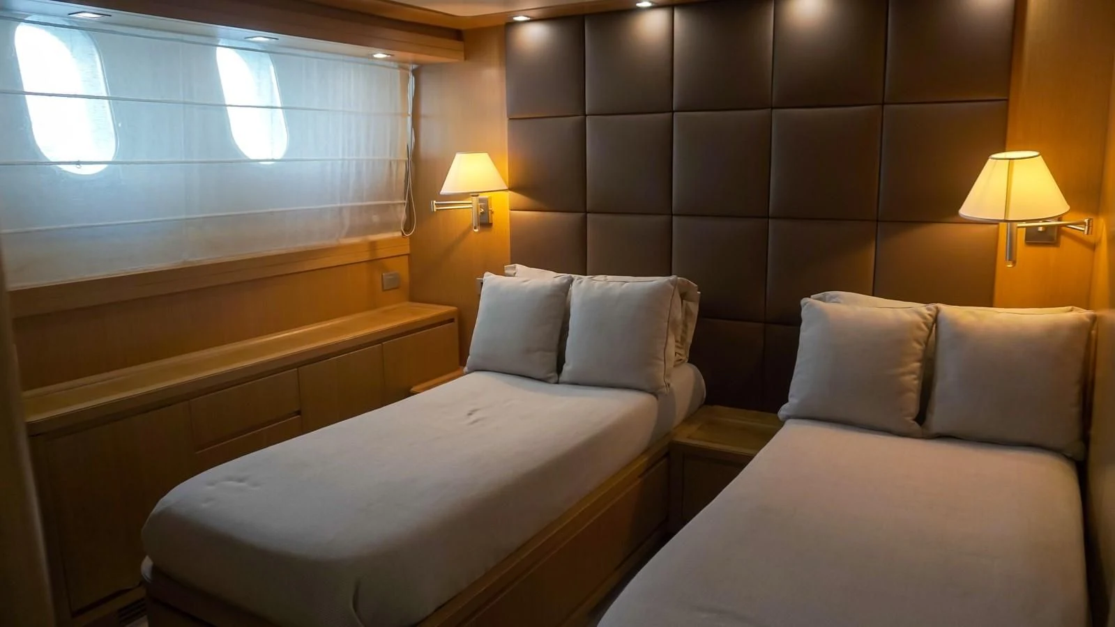 a couple of beds in a hotel room aboard PETRUS Yacht for Sale