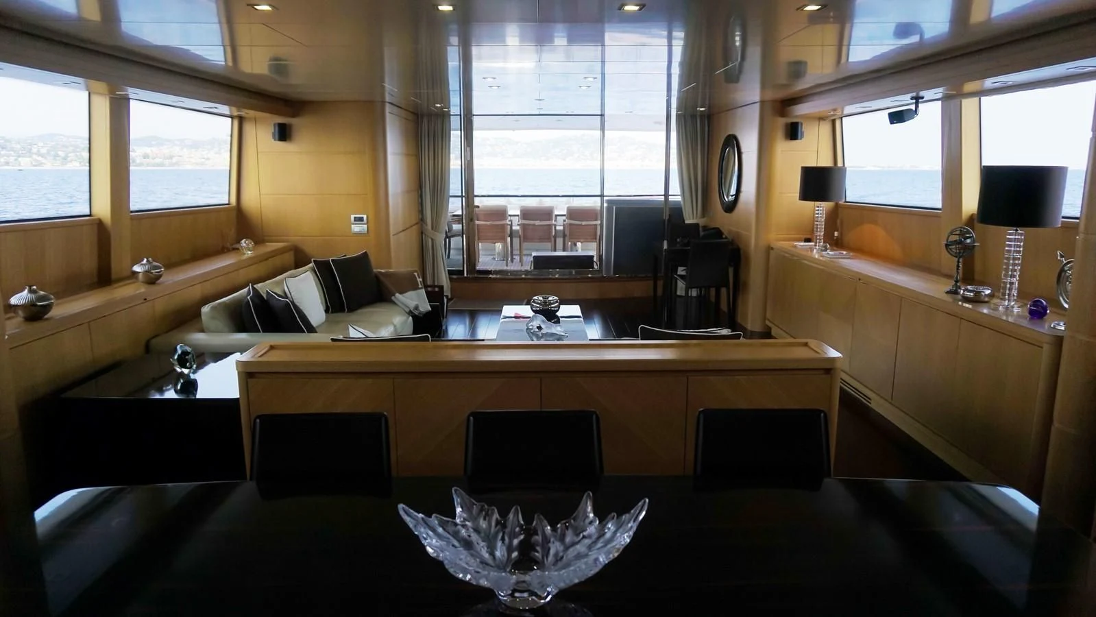 a room with a couch and a table aboard PETRUS Yacht for Sale
