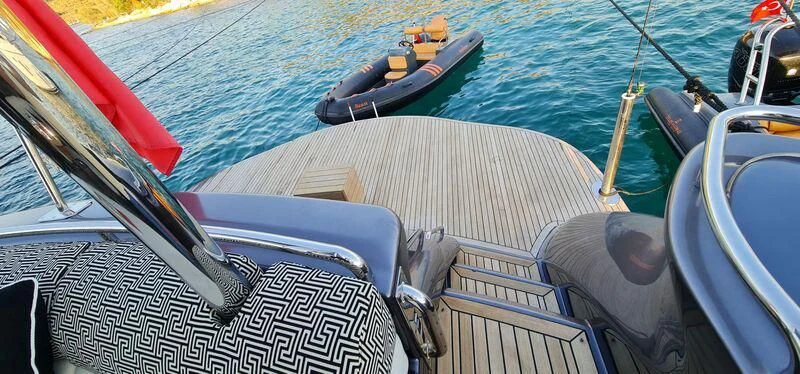 a boat with a cover on the front aboard CELINE Yacht for Sale