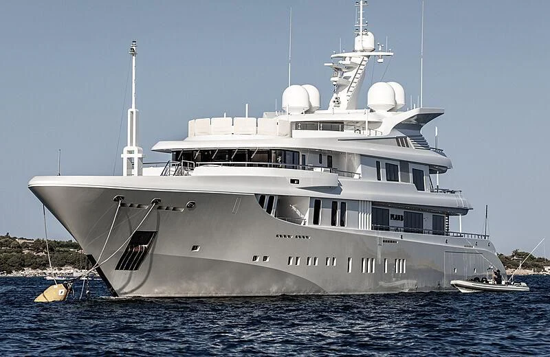 a large white ship aboard PLAN B Yacht for Sale