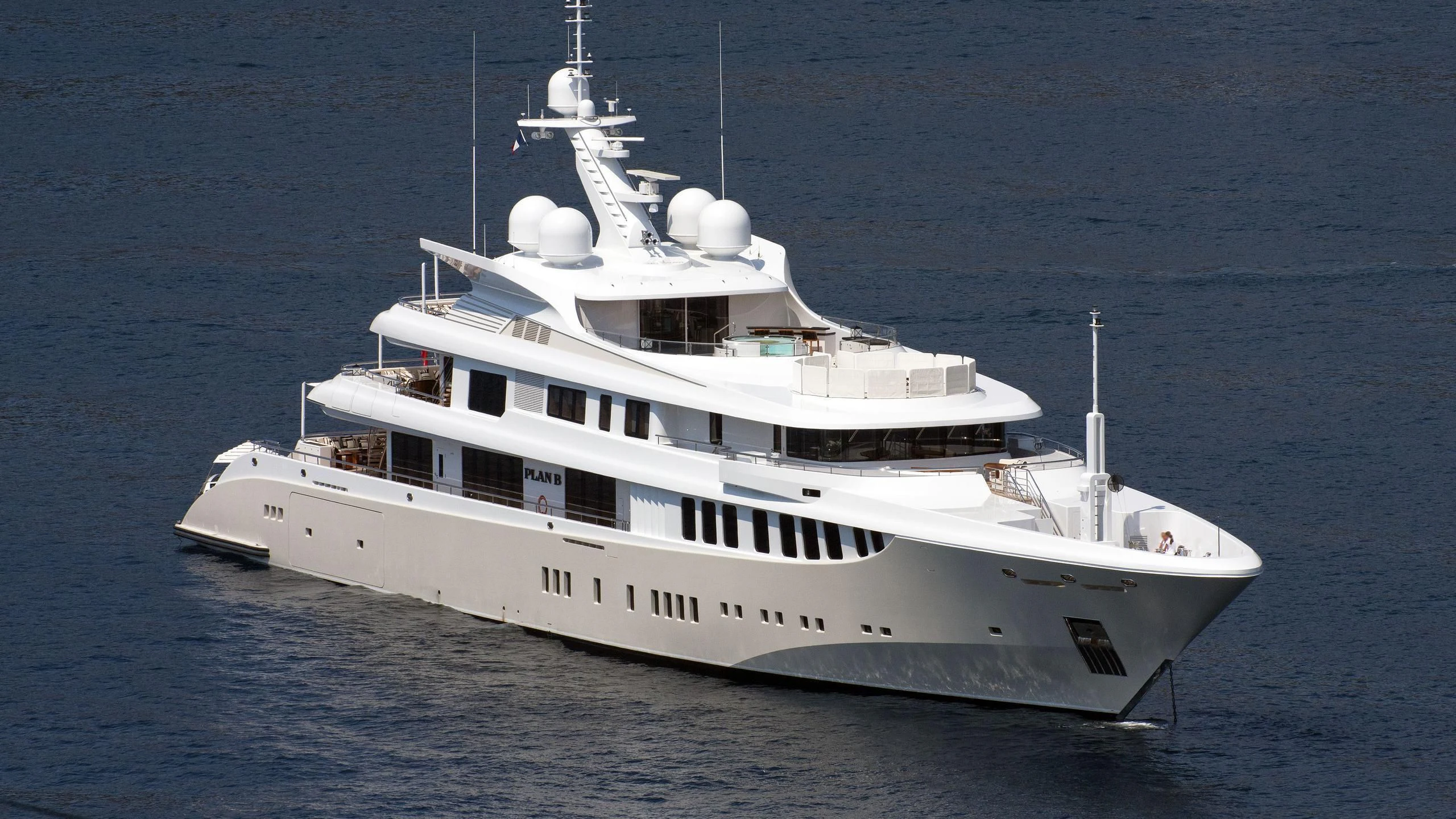 a large white ship aboard PLAN B Yacht for Sale