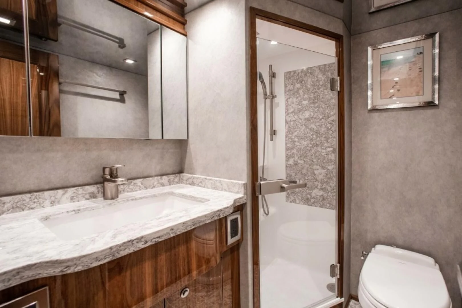 a bathroom with a sink and a toilet aboard MANA Yacht for Sale