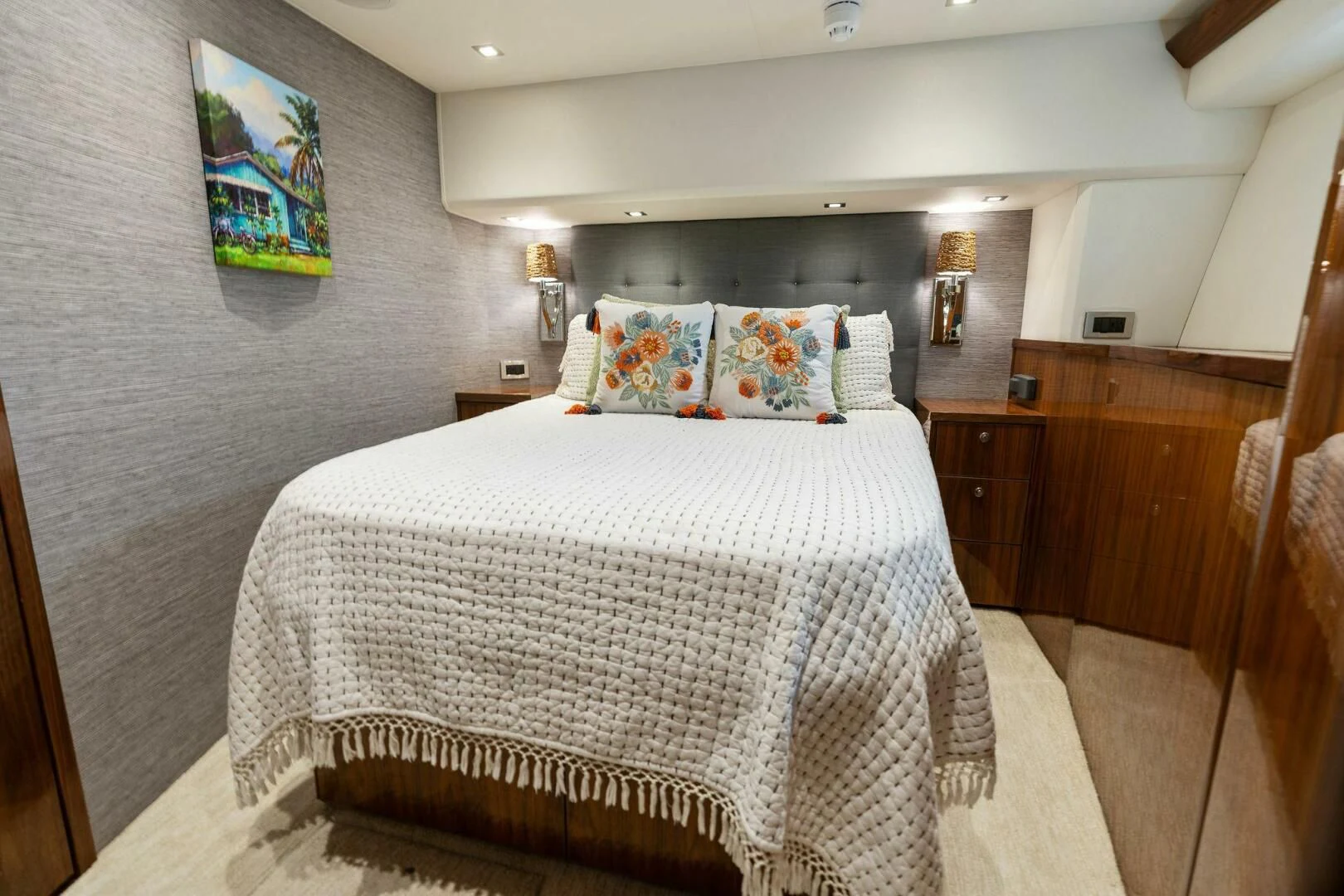 a bed with a white sheet aboard MANA Yacht for Sale