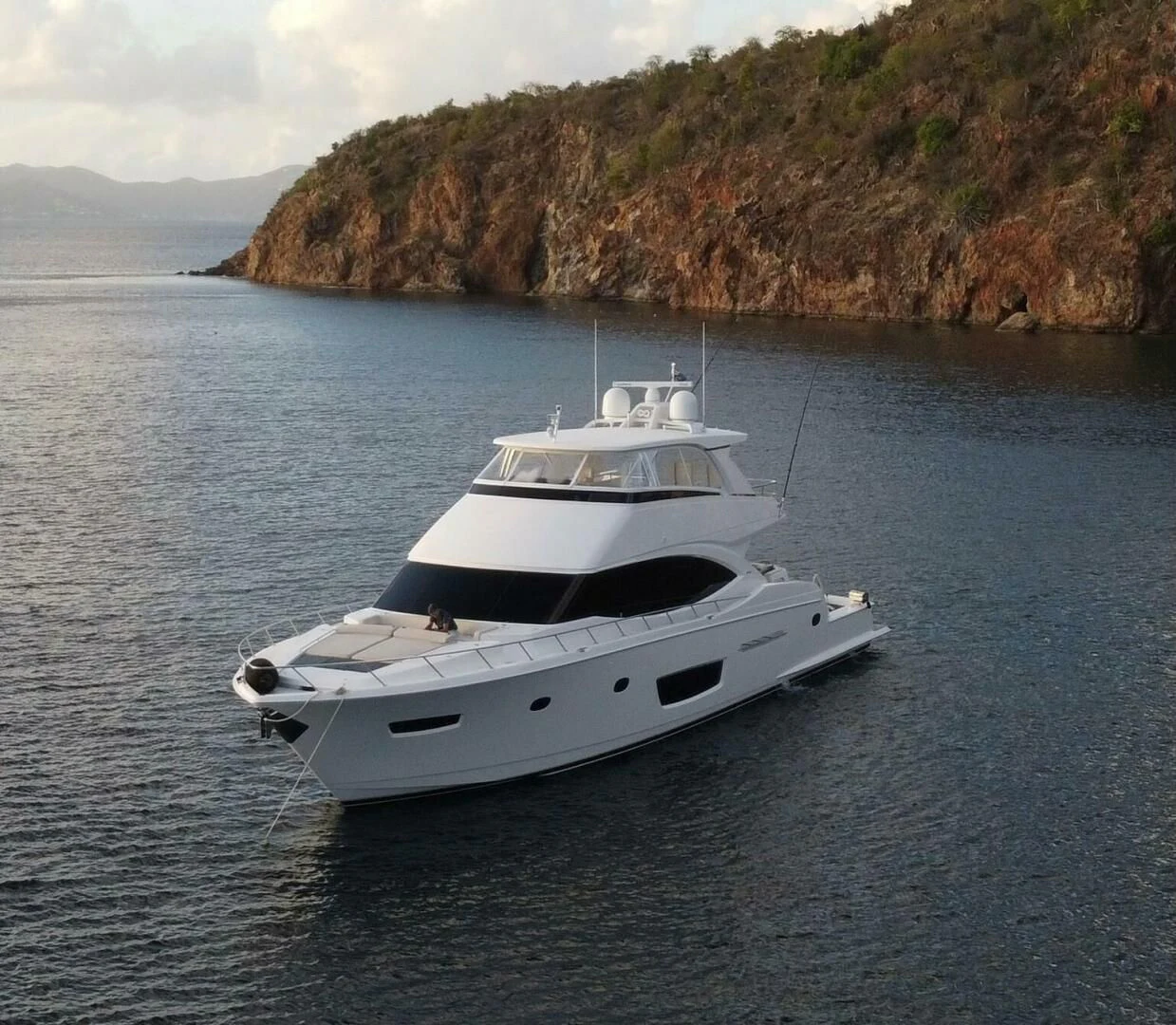 a white yacht in the water aboard MANA Yacht for Sale