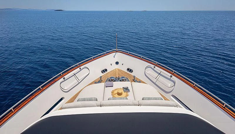 a white boat on the water aboard GRACE Yacht for Sale