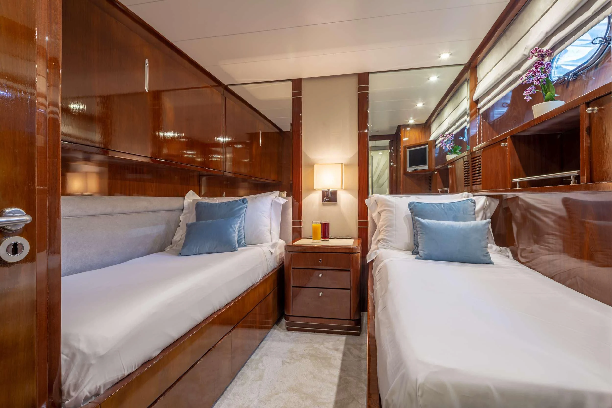 a room with two beds aboard GRACE Yacht for Sale