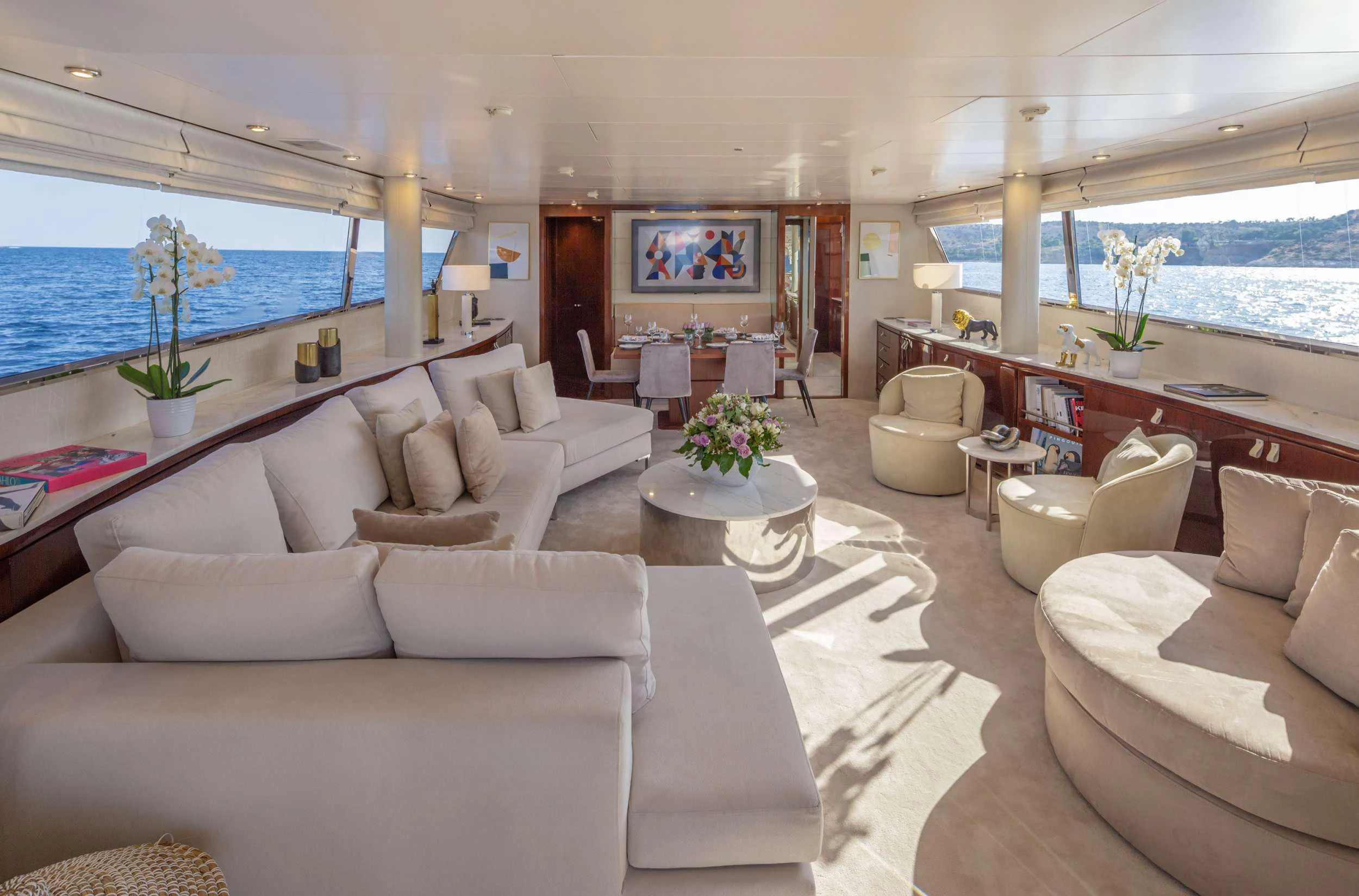 a living room with a large window aboard GRACE Yacht for Sale
