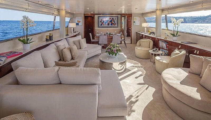 a living room with a large window aboard GRACE Yacht for Sale