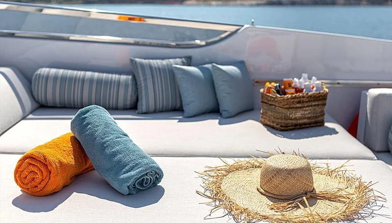 a boat on a table aboard GRACE Yacht for Sale