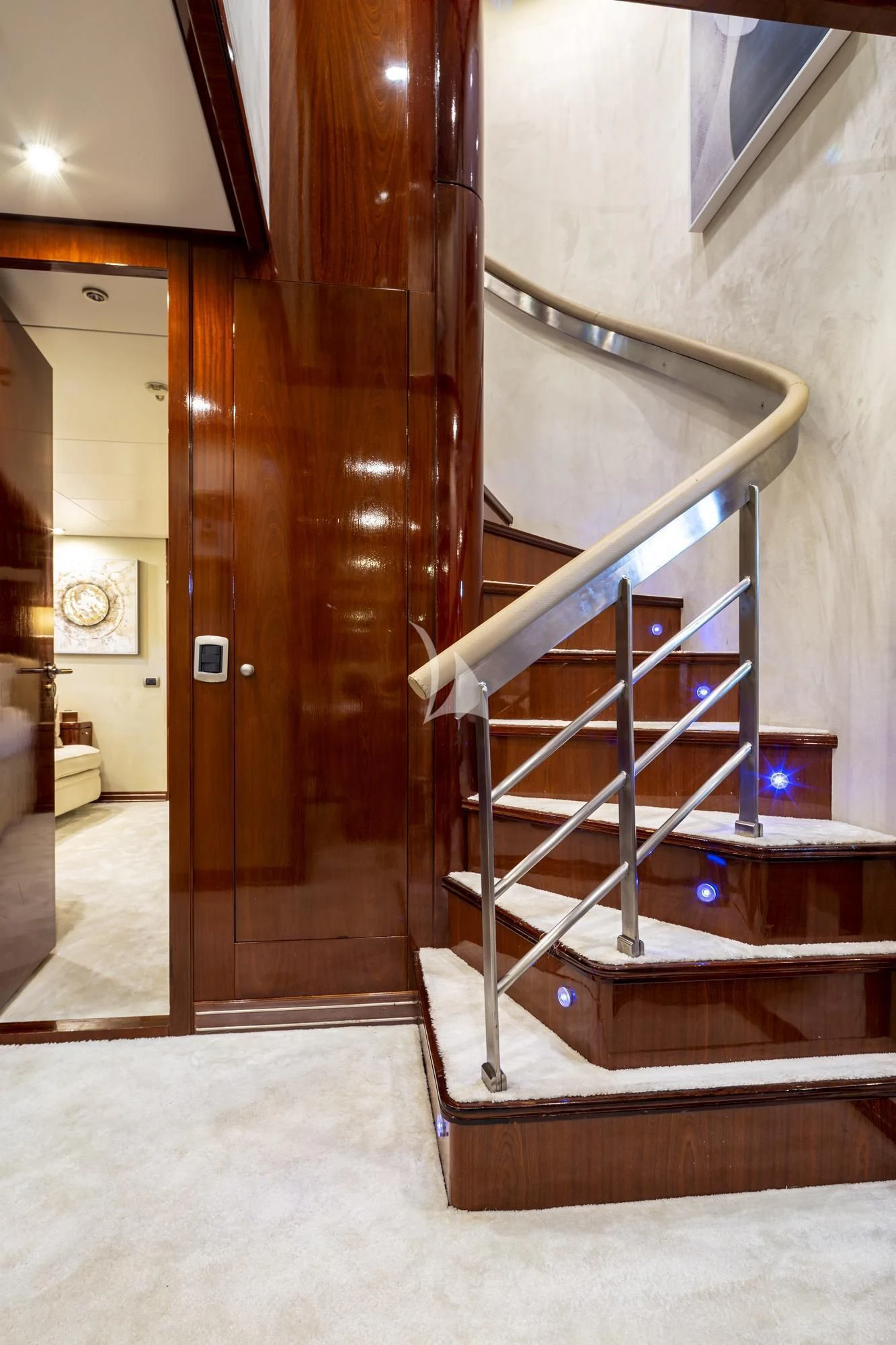 a wooden staircase in a house aboard GRACE Yacht for Sale