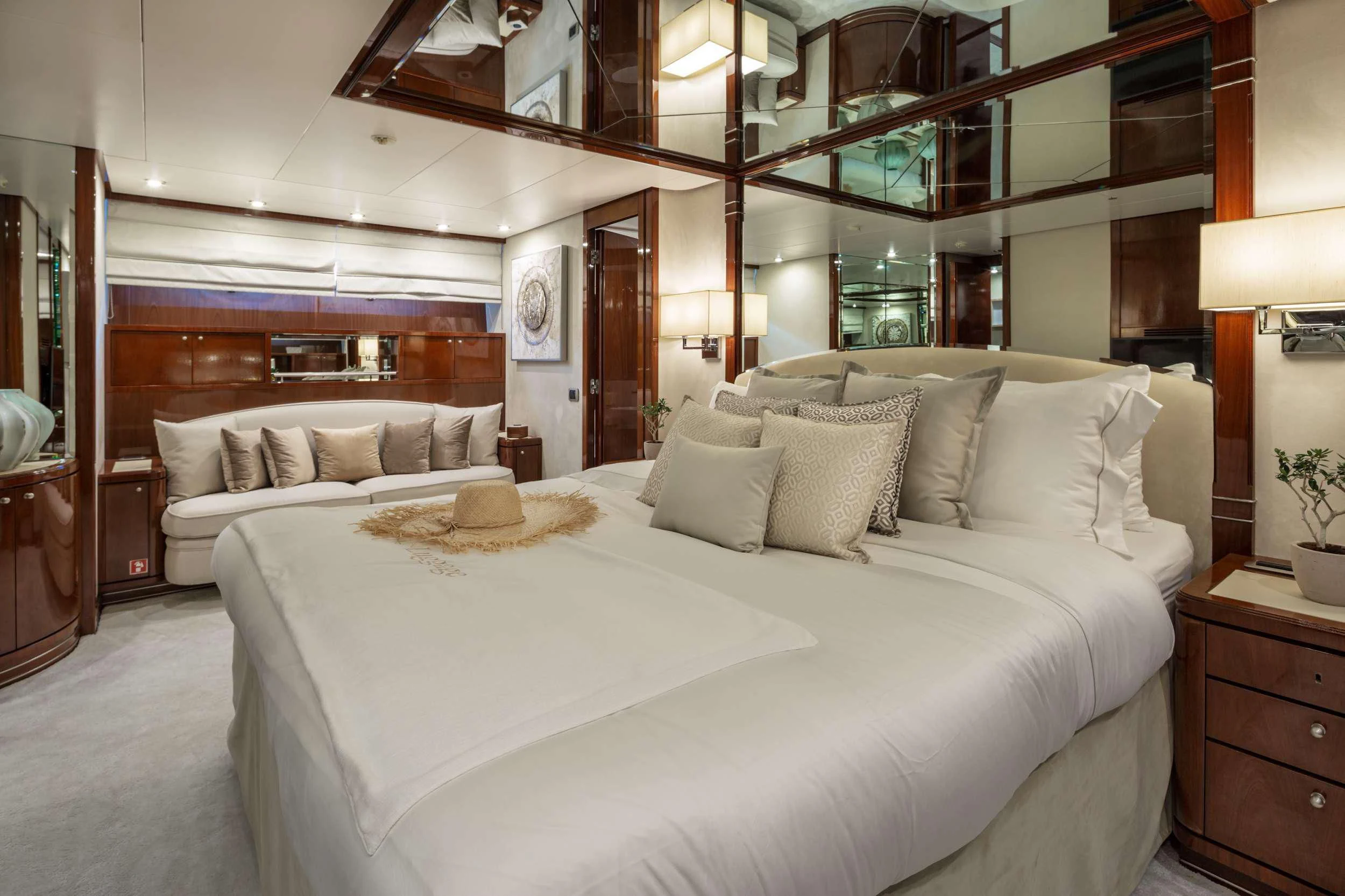 a large bed in a room aboard GRACE Yacht for Sale