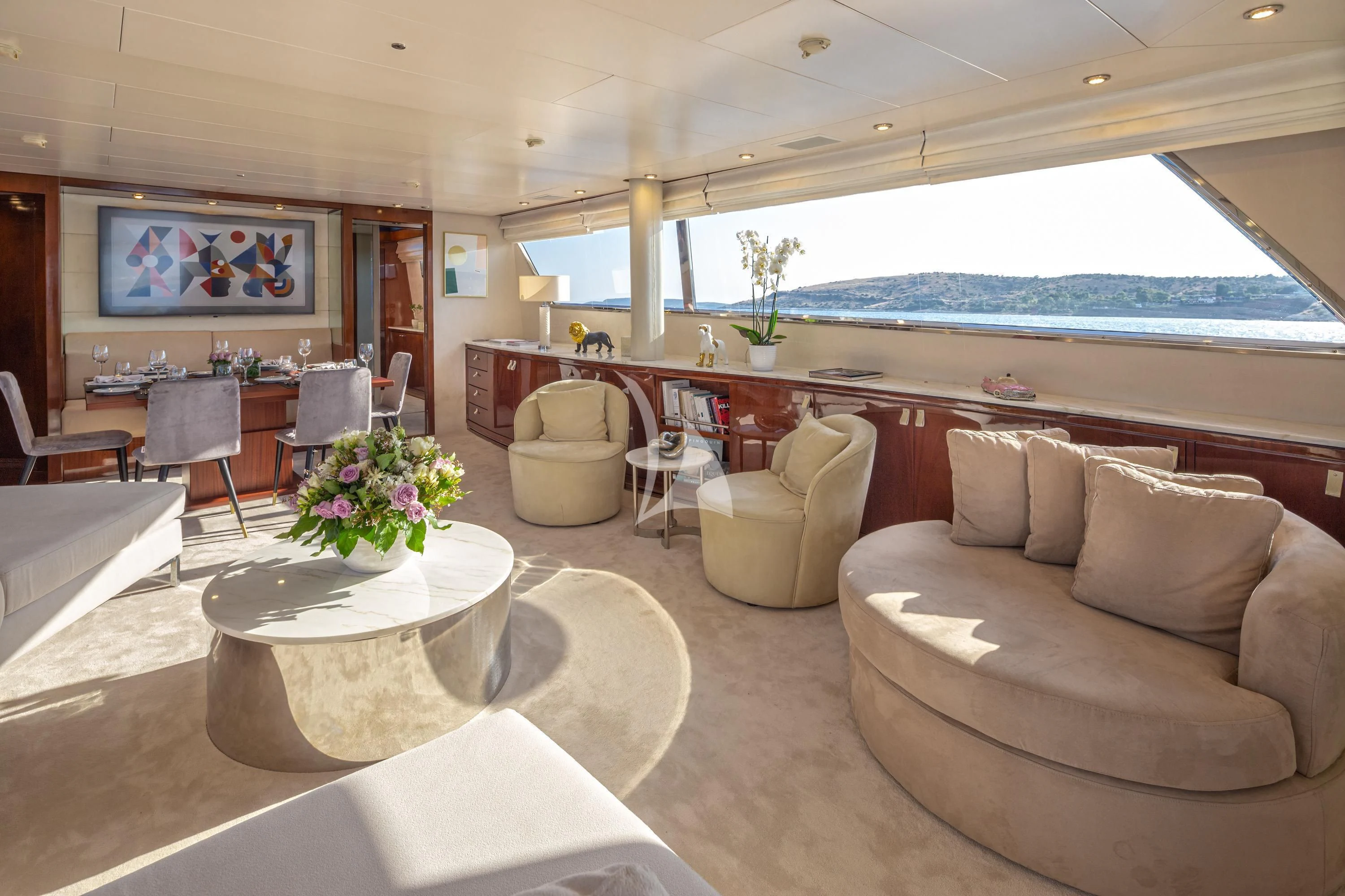 a living room with a large window aboard GRACE Yacht for Sale