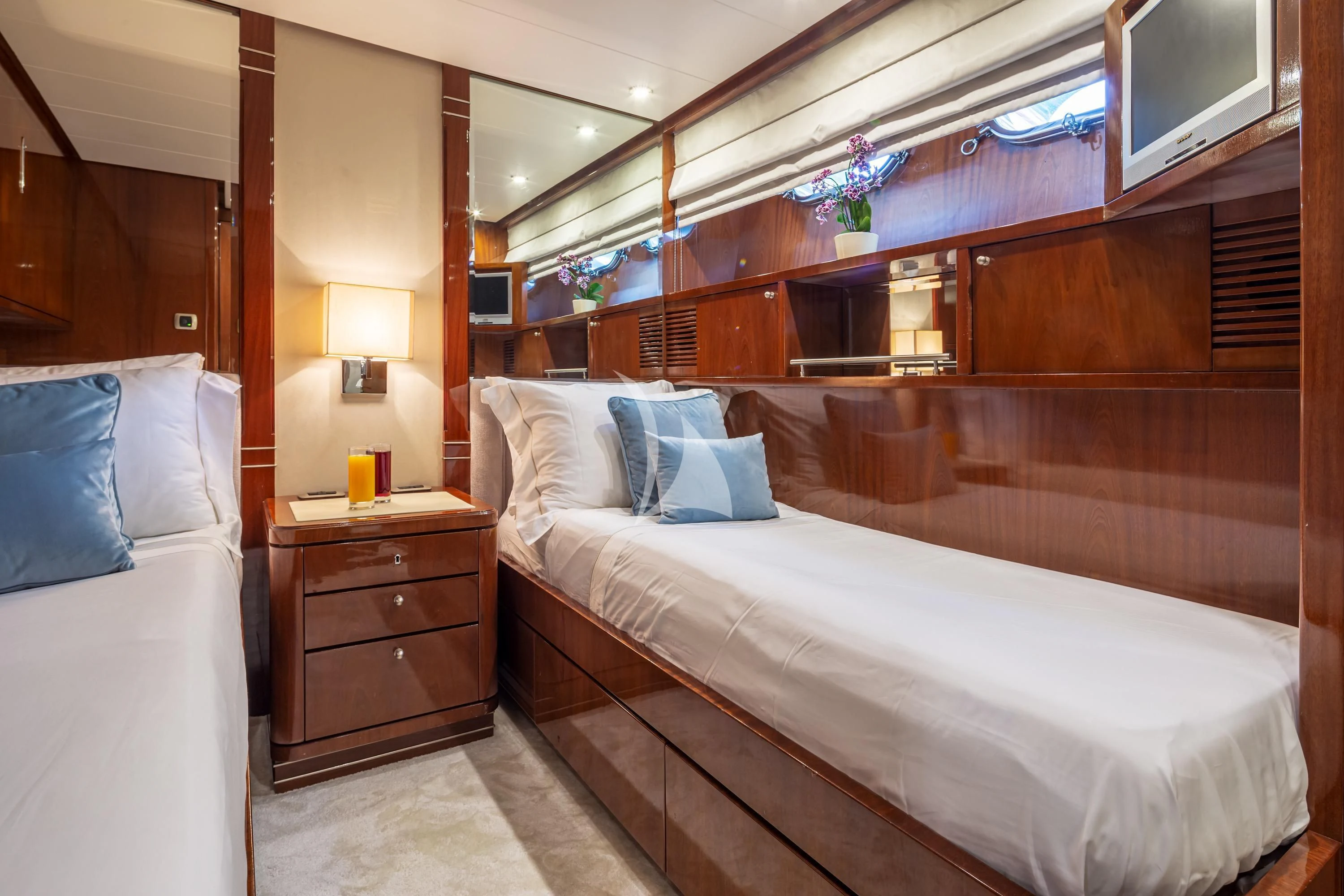 a room with a bed and a window aboard GRACE Yacht for Sale