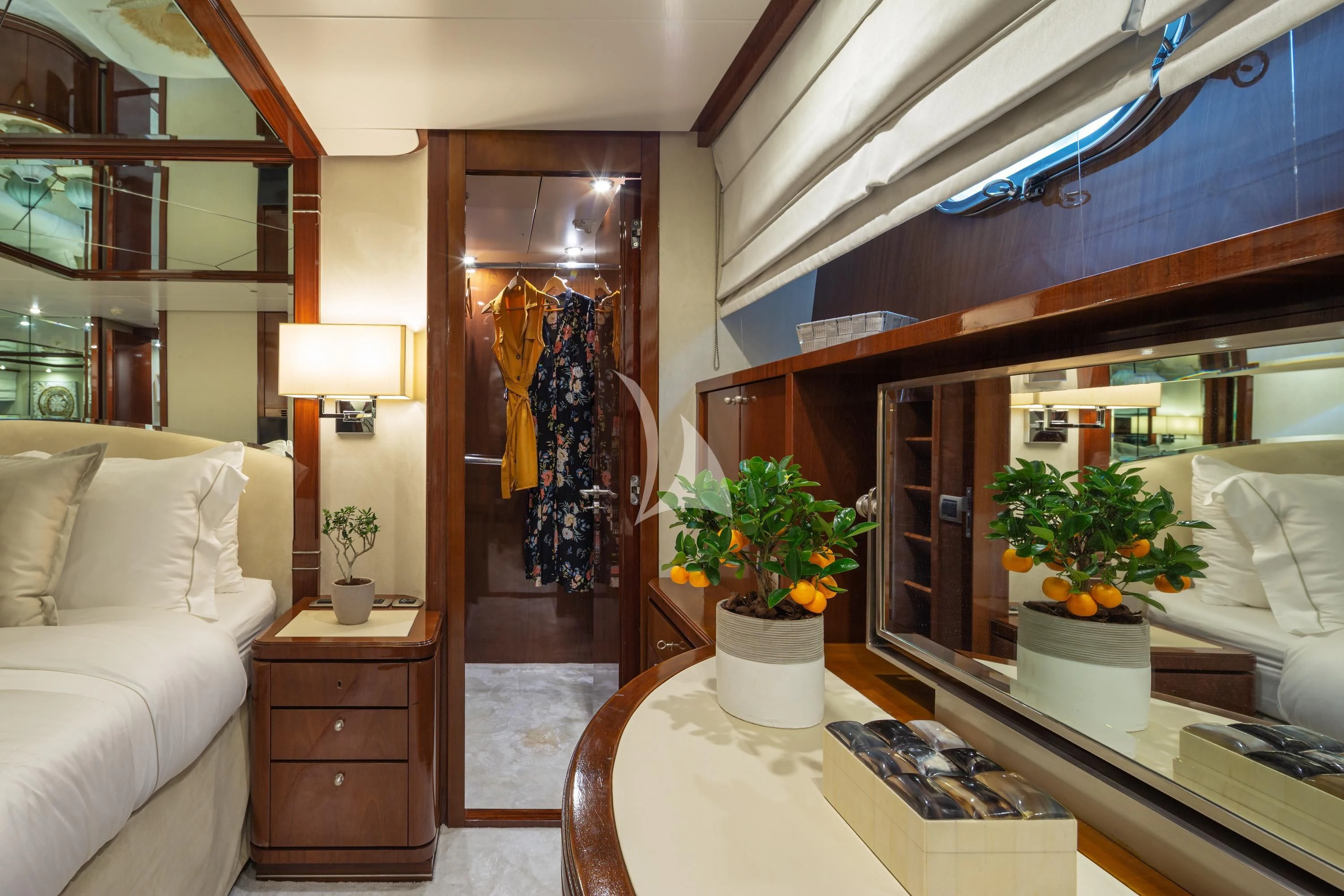 a room with a bed and a desk aboard GRACE Yacht for Sale