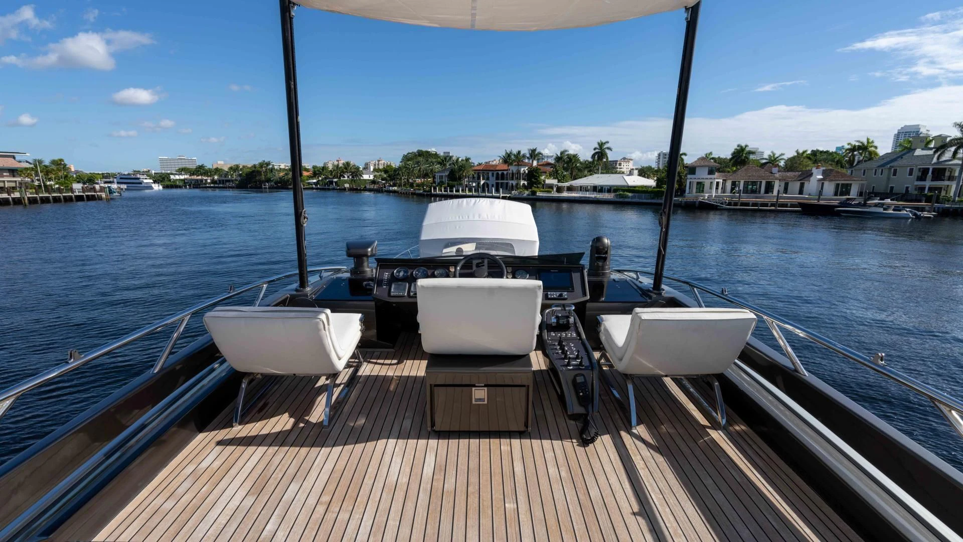 a boat dock with chairs and tables aboard VIXEN Yacht for Sale