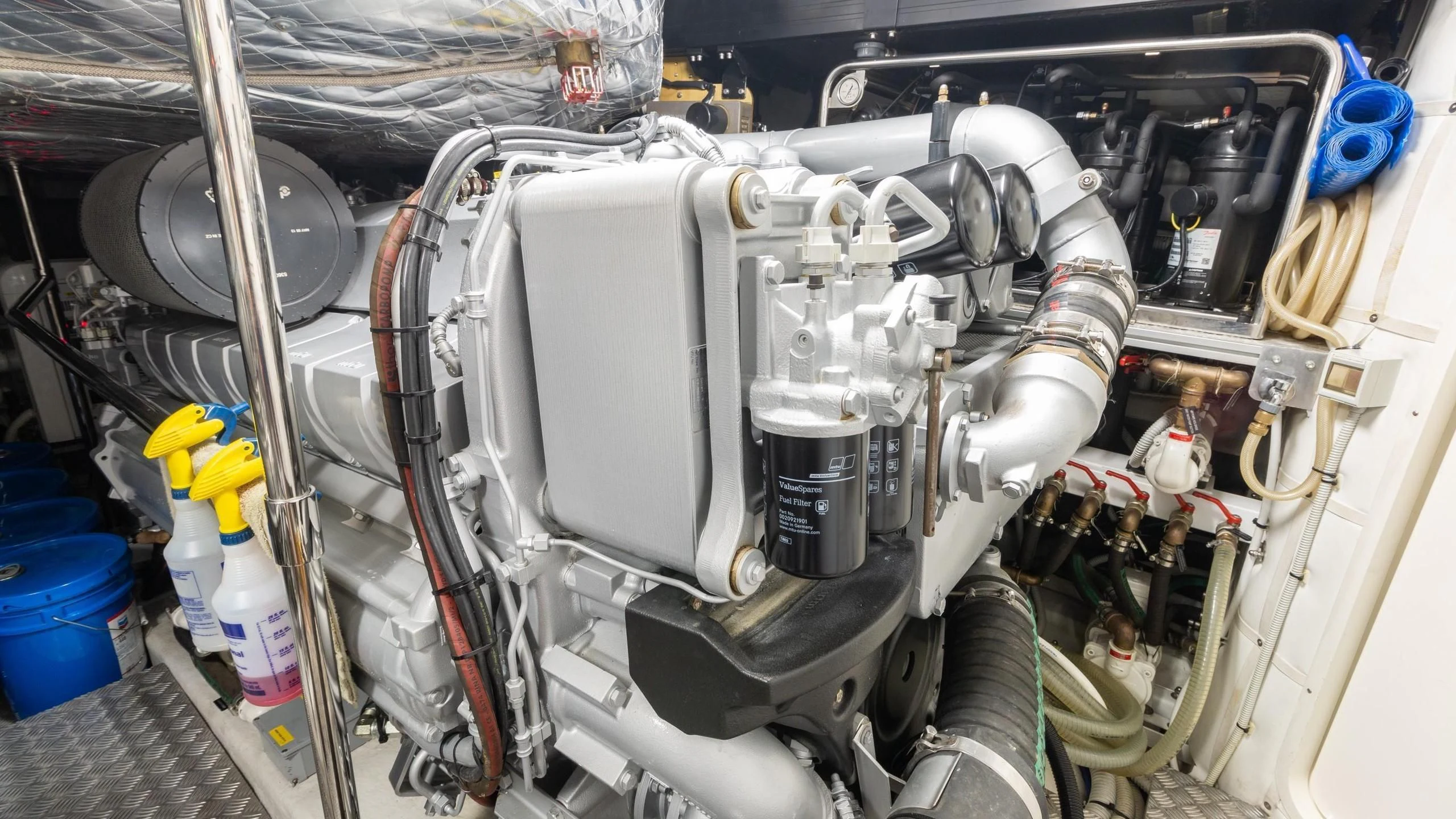 a car with a large engine aboard VIXEN Yacht for Sale