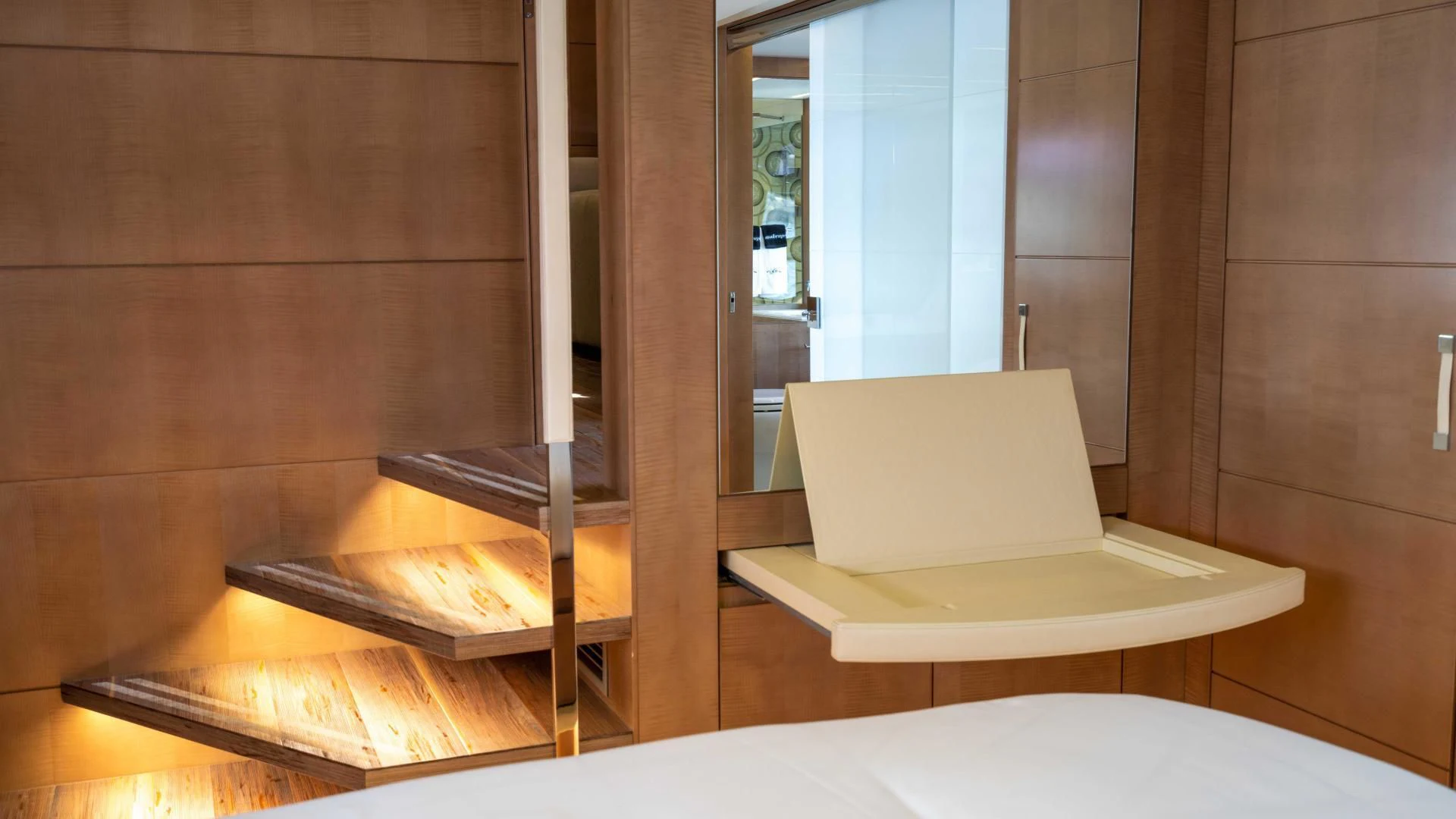 a room with a laptop and a staircase aboard VIXEN Yacht for Sale