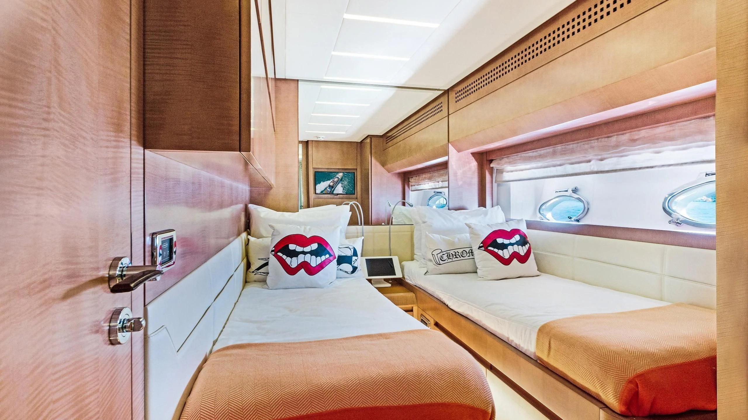a couple of beds in a room aboard VIXEN Yacht for Sale