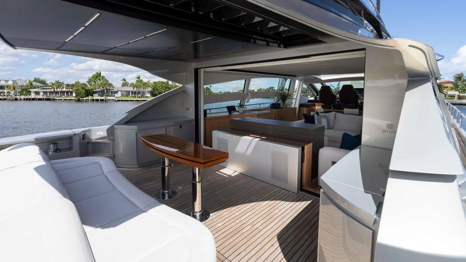 a boat with a table and chairs aboard VIXEN Yacht for Sale