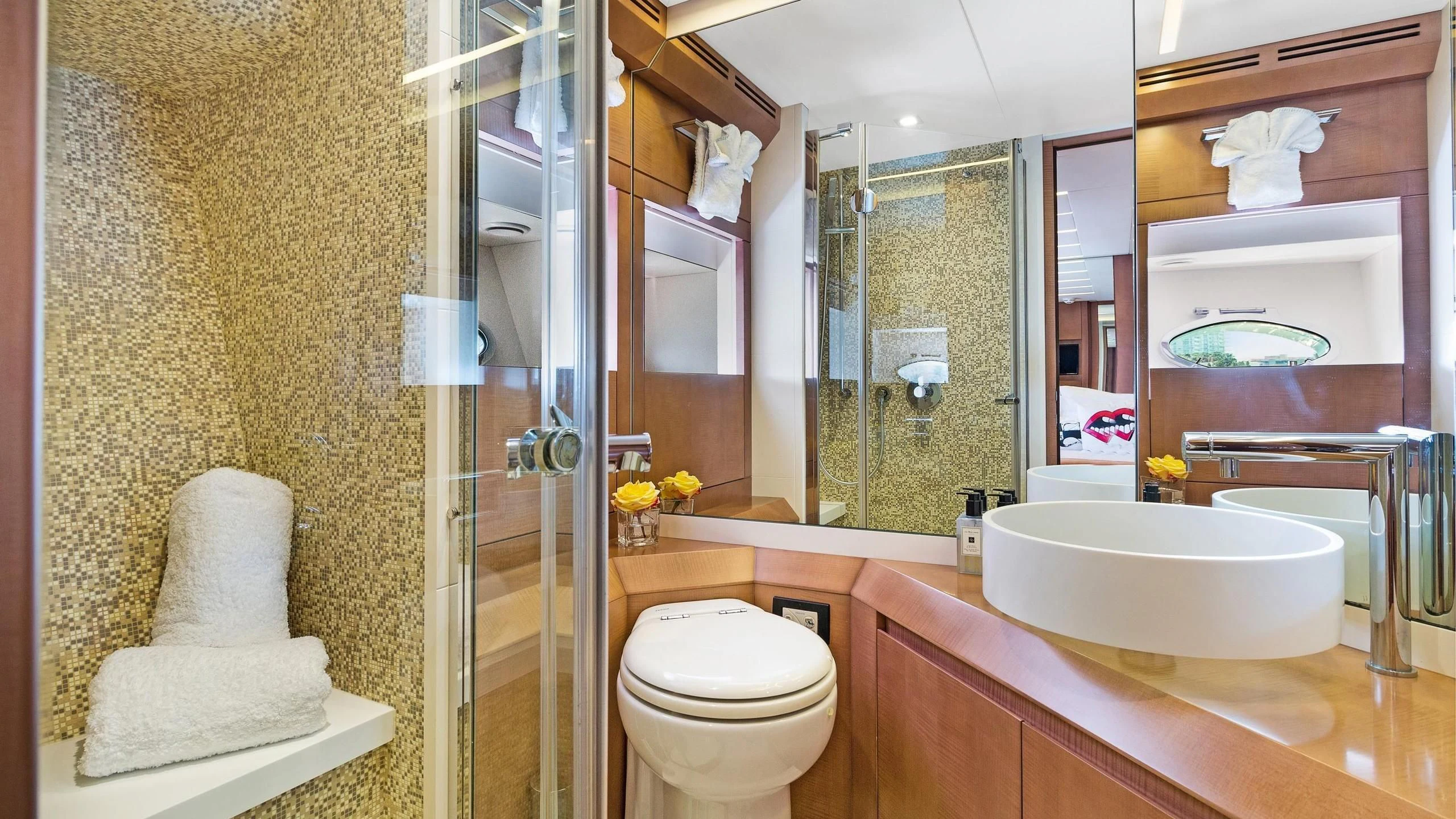 a bathroom with a sink toilet and a shower unit aboard VIXEN Yacht for Sale