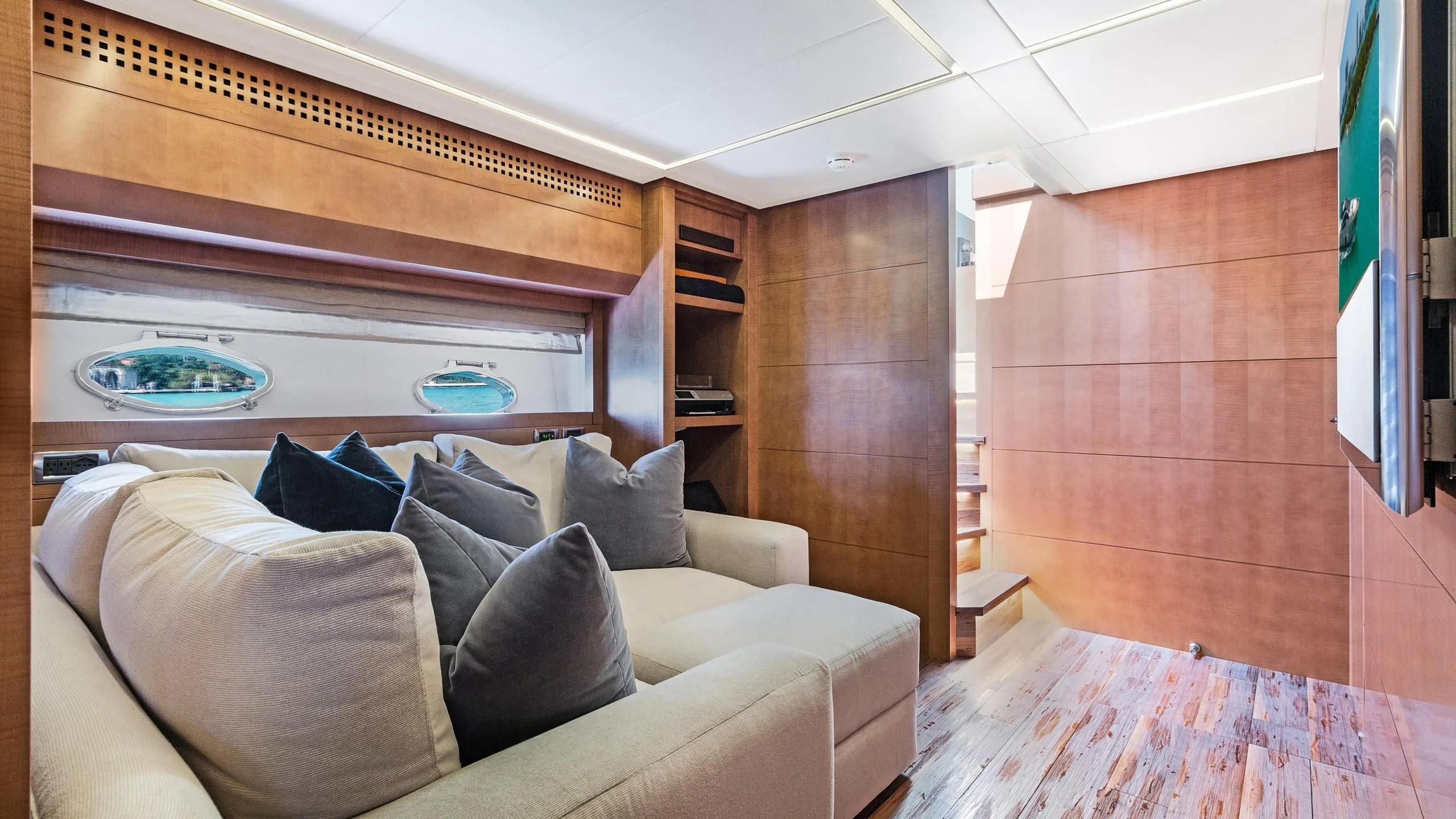 a room with a couch and a window aboard VIXEN Yacht for Sale