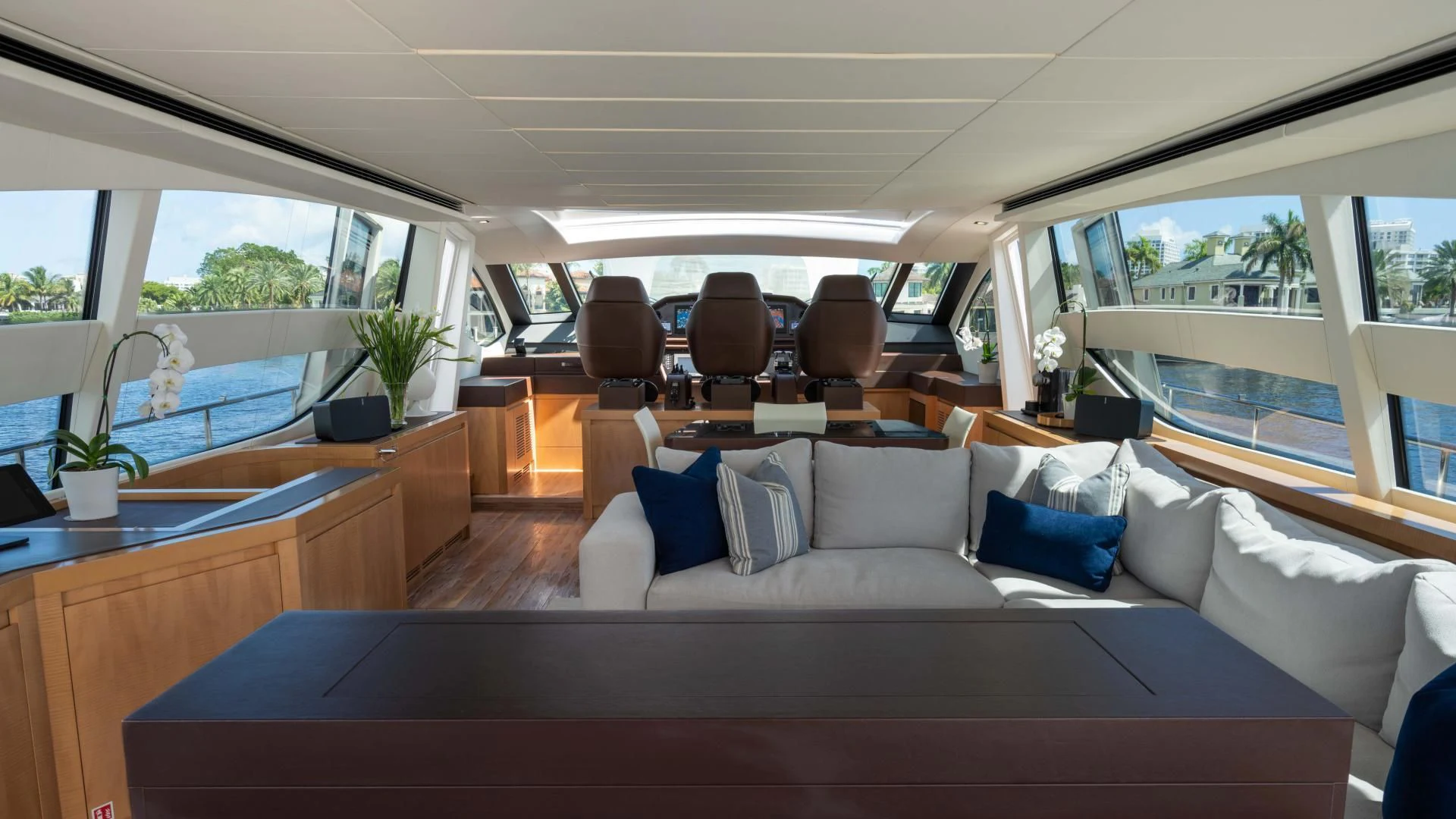 a large living room with a large window aboard VIXEN Yacht for Sale