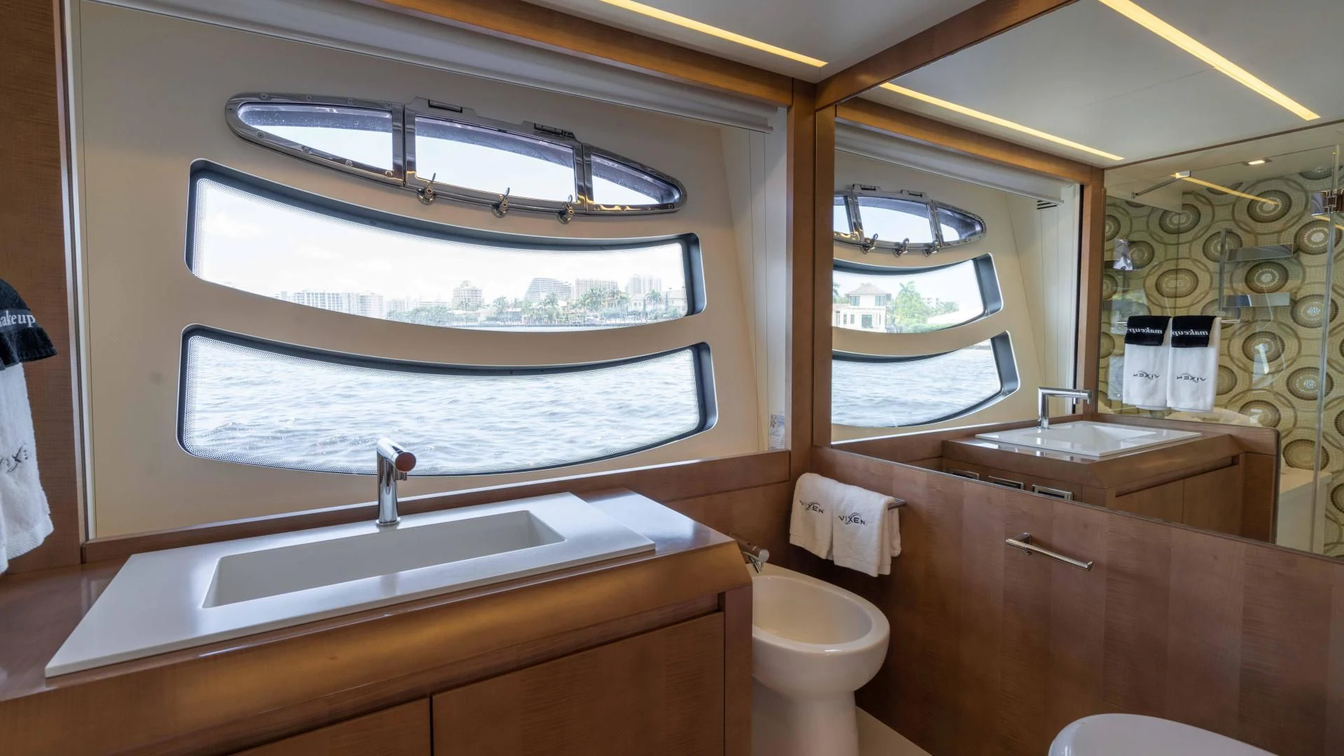 a bathroom with a large window aboard VIXEN Yacht for Sale