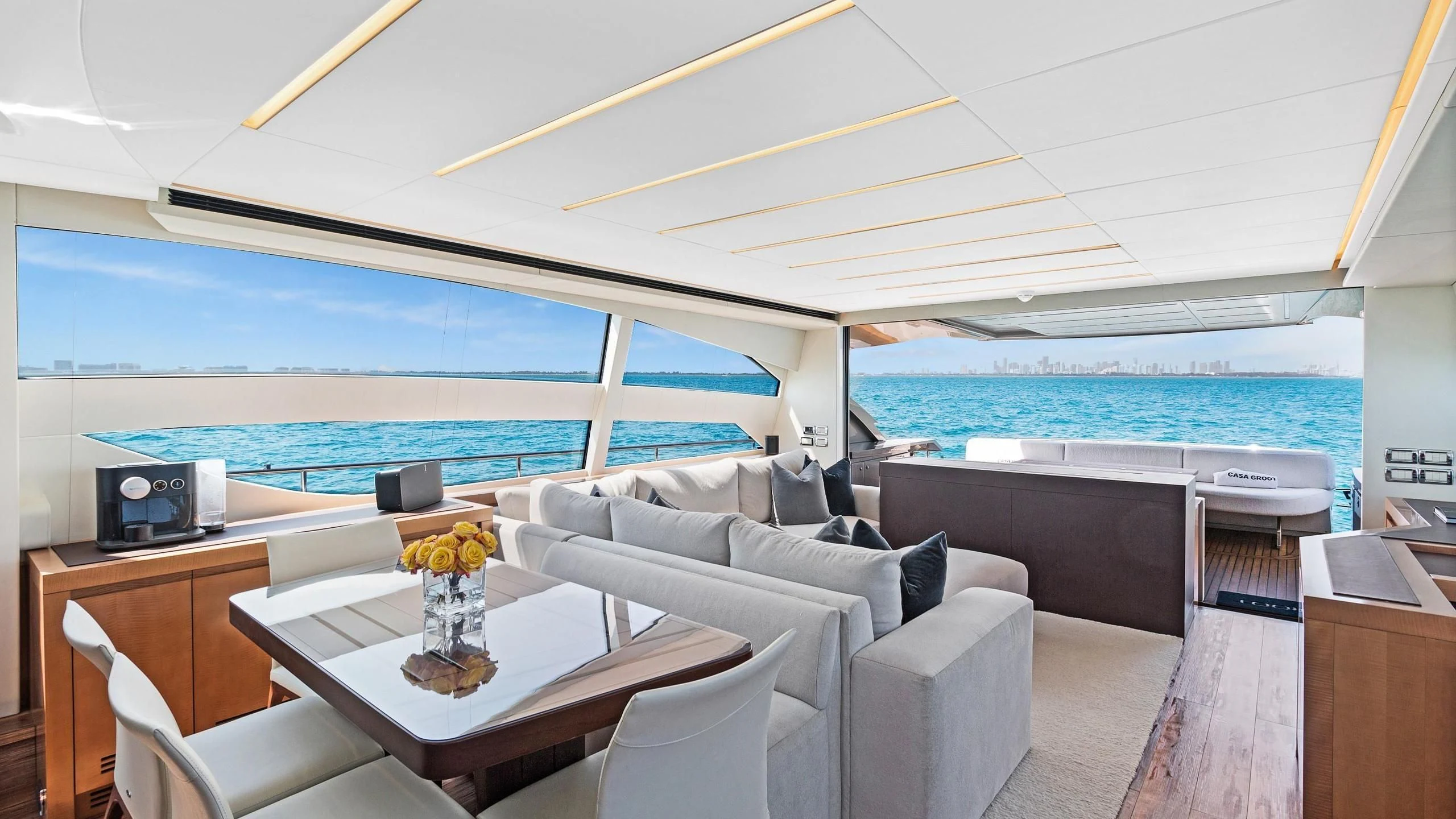 a room with a table and chairs aboard VIXEN Yacht for Sale